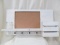 WHITE SHELF WITH CORKBOARD AND VASE