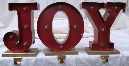 JOY LIGHT UP STOCKING HOLDERS ( BATTERY OPERATED)