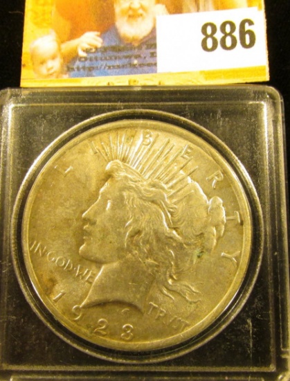 1923 P U.S. Peace Silver Dollar, AU-Uncirculated. In a Snaptight case.