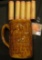Morton Parrot design brown-glazed Stoneware Beer Mug with (5) Rolls of Bank-wrapped Wheat Cents.