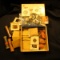 Tiparillo Cigar Box full of old coins in rolls, manila envelopes, and cardboard holders. Includes a