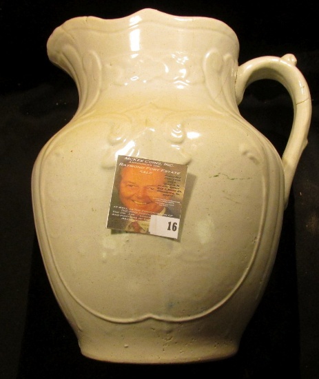 Antique Stoneware off-white colored Pitcher, no wash bowl. Several hair line cracks. 10 1/2".