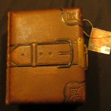 Leather & Brass Buckled Photo Album, no photos present. Gold-gilt edge lettering.