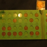 1910-48S Partial Set of Lincoln Cents in a green Popular Album.