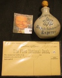 Small Stoneware Advertising Bottle with wood or Cork stopper. 