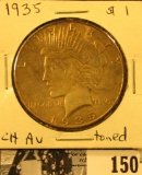 1935 P U.S. Peace Silver Dollar, Choice AU with superb light gold toning.