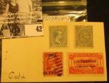 Bag with (4) Cuba Stamps, two are mint one has a 1928 Lindbergh overprint.