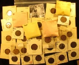 (24) 1906, (26) 1907, (11) 1908, & (1) 1909 Indian Head Cents grading up to EF. Most are carded and