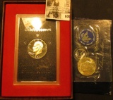 1971 S Proof & Uncirculated Silver Eisenhower Dollars. Both in original holders.