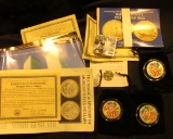 Group of Coin literature, COAs and etc. as well as a 1999 Delaware Quarter from Lois with a letter t