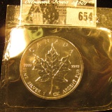 1991 Canada Five Dollar One Ounce .9999 Fine Silver Maple Leaf in mint sealed plastic.