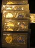 (1) 1973 S & (5) 74 S Silver Eisenhower Dollars in original blue packs of issue. All Gem BU.