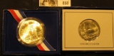 1986 D Statue of Liberty Half Dollar in original box of issue & 1986 P Statue of Liberty Silver Doll