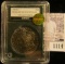 1114 . 1904-S Super Toned U.S.  Morgan Silver Dollar in a slabbed holder.