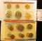 1152 . Pair of 1972 U.S. Mint Sets, both in original cellophane, one in original envelope.