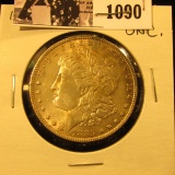 1090 . 1885 P U.S. Morgan Dollar, Uncirculated. Nice attractive gold toning.