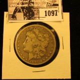 1097 . 1891 CC U.S. Morgan Silver Dollar, Fine.