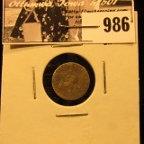 986 . 1858 U.S. Three-Cent Silver, VF, but bent.