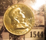 1544 . 1958 D Franklin Half Dollar, Brilliant Uncirculated.