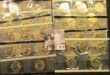 1611 . 1999 P & D, 2000 P, D, 2001 P, D, 2002 P, D, 2003 P, & D U.S. Five-Piece Quarter Mint Sets. (