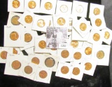 1761 . (45) various carded Lincoln Cents dating from 1955S to 1982. Most of which are BU and include