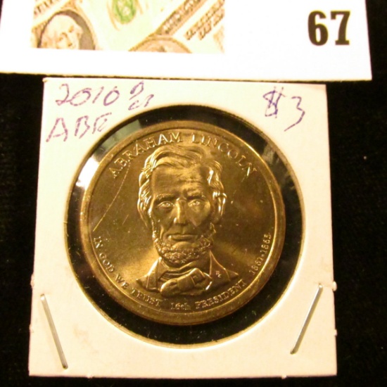 2010 D Gem Uncirculated Abraham Lincoln Presidential Dollar Coin.