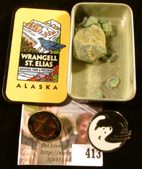 Souvenirs from a trip to Alaska – a box from Wrangell St. Elias National Park, a GoldStar Service pi