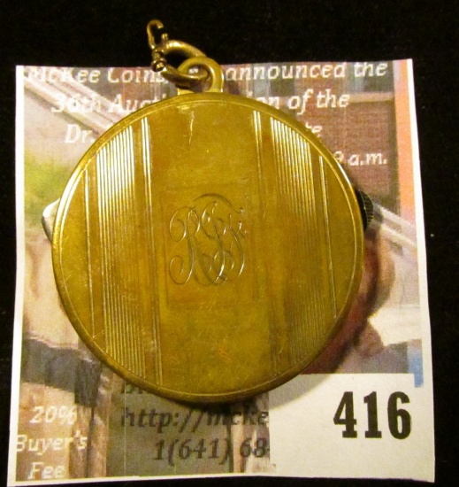 5 year disc-style mechanical calendar, 1941-1946, with knife and nail file, engraved with cursive RJ