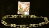 16” silver and malachite neck choker chain. Odd link style with doubled chains between 10 links, The