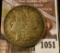 1051 . 1898 Morgan Silver Dollar, BU toned, full breast feathers, c