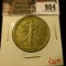 984 . 1934 Walking Liberty Half Dollar, AU, value $26