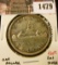 1479 . 1953 SF Canada Silver Dollar, AU+ toned, value $20+