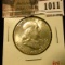 1011 . 1954 Franklin Half Dollar, UNC toned, value $14