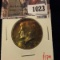 1023 . 1965 Kennedy Half Dollar, BU beautifully toned, value $17