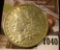 1040 . 1884 Morgan Silver Dollar, VF/XF, value $35