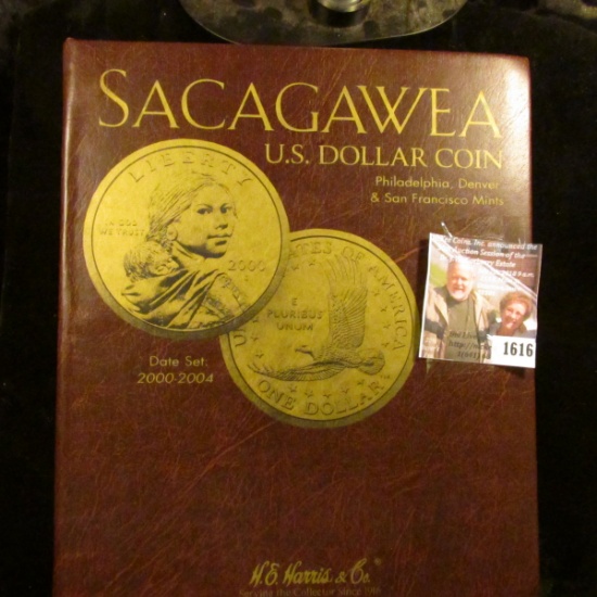 1616 . HE Harris And Company Coin Album With Sacagawea Dollars Star