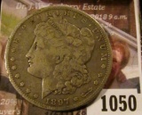 1050 . 1897-S Morgan Silver Dollar, VF, value $35