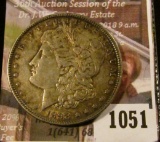 1051 . 1898 Morgan Silver Dollar, BU toned, full breast feathers, c