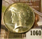 1060 . 1924 Peace Silver Dollar, BU, MS63 value $40, MS64 value $60