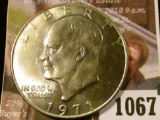1067 . 1971 Eisenhower Dollar, BU toned, Eisenhower Dollars are HOT