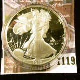 1119 . 1989 American Silver Eagle, Proof in Mint capsule, value $60