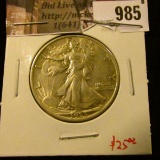 985 . 1935 Walking Liberty Half Dollar, AU, value $25