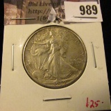 989 . 1939 Walking Liberty Half Dollar, AU, value $25