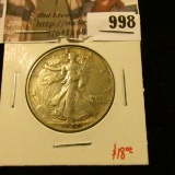 998 . 1947 Walking Liberty Half Dollar, XF, value $18