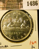 1486 . 1963 Canada Silver Dollar, BU, value $30+