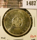 1487 . 1964 Canada Silver Dollar, BU, value $30+