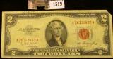 1519 . Series 1953 United States Note, Red Seal, small piece of upp