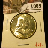 1009 . 1953 Franklin Half Dollar, BU MS63+, value $27
