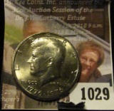 1029 . 1976 Kennedy Half Dollar, BU, off-center strike, value $30+