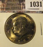 1031 . 1983-P Kennedy Half Dollar, BU toned, struck through grease,
